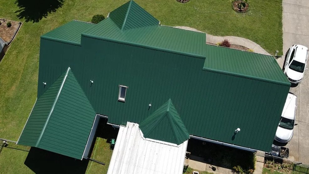 Green traditional exposed fastener metal roof