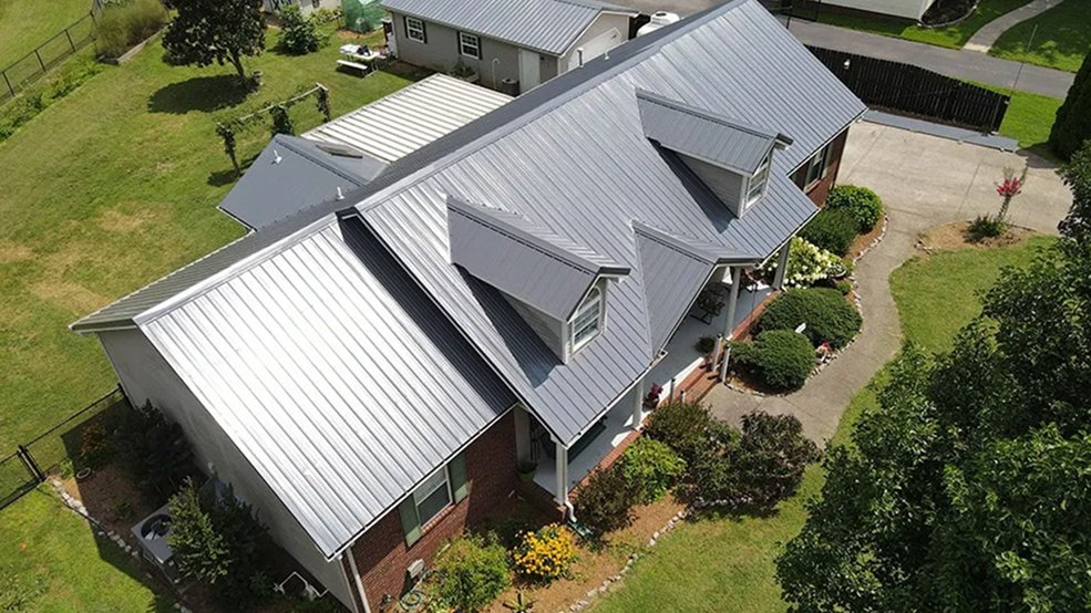 Gray traditional metal roof panel and edge trim