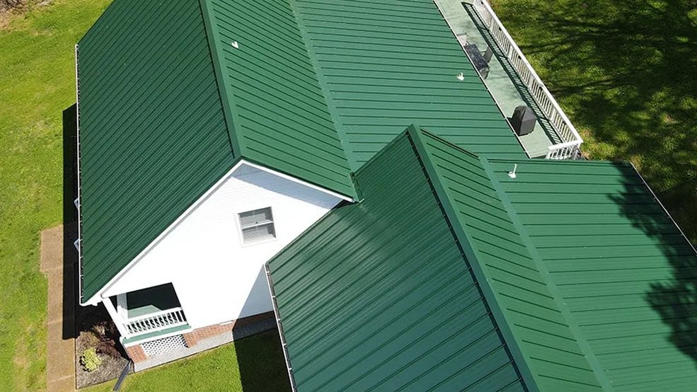 Green standing seam metal roof panel and seam detail