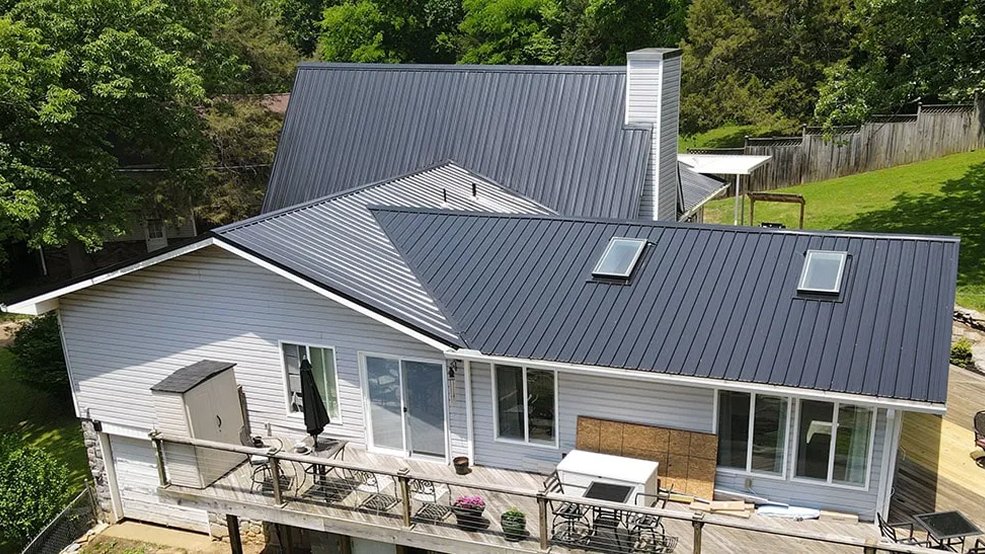 Black traditional exposed fastener metal roofing