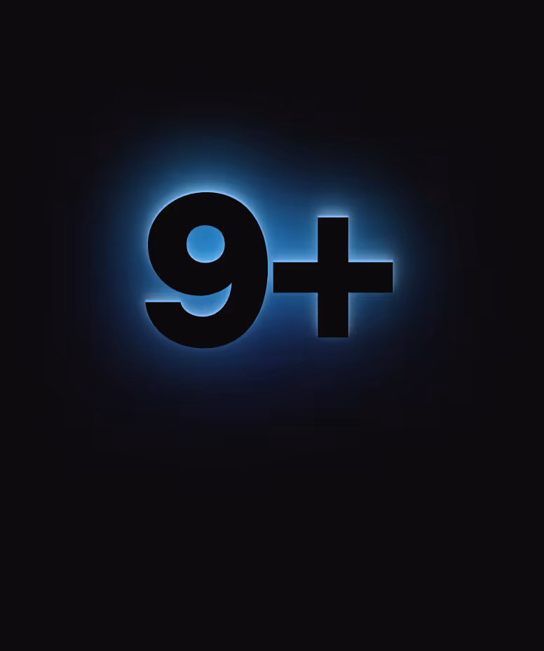 Black number 9 with a plus sign glowing with a blue light on a black background.