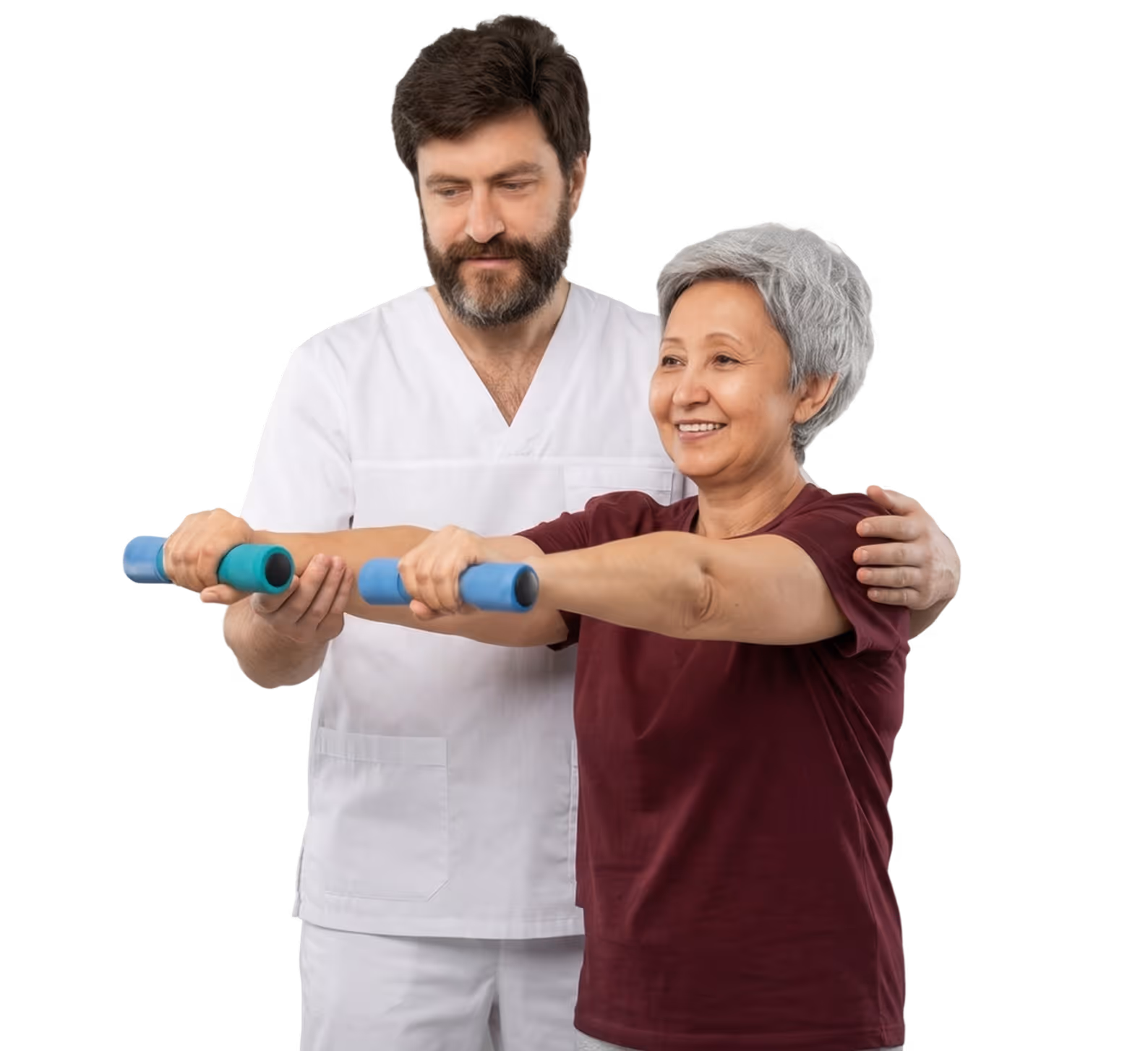 Senior woman doing arm exercises with dumbbells guided by a male physical therapist in white scrubs.