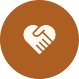White heart formed by two hands on brown circular background symbolizing care and unity.