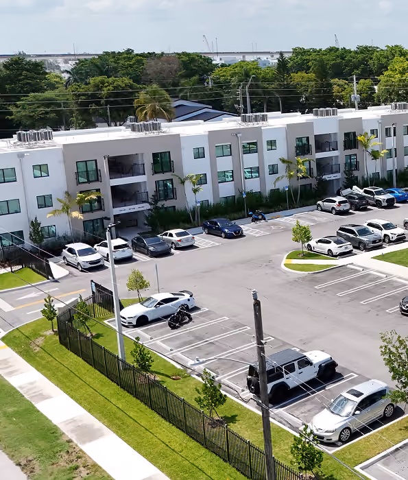 Modern three-story apartment building  by MT Construction Miami