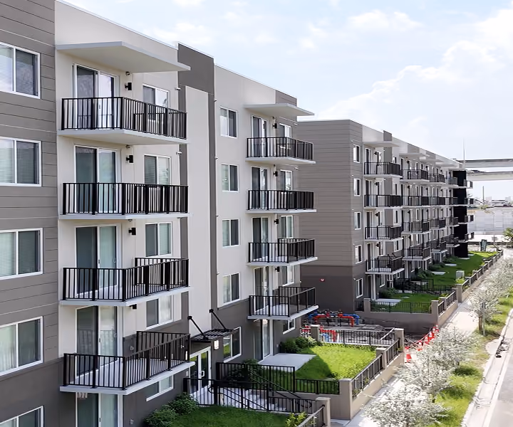 Modern multi-story apartment buildings by MT Construction Group Miami