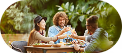 People enjoying a meal at an outdoor restaurant