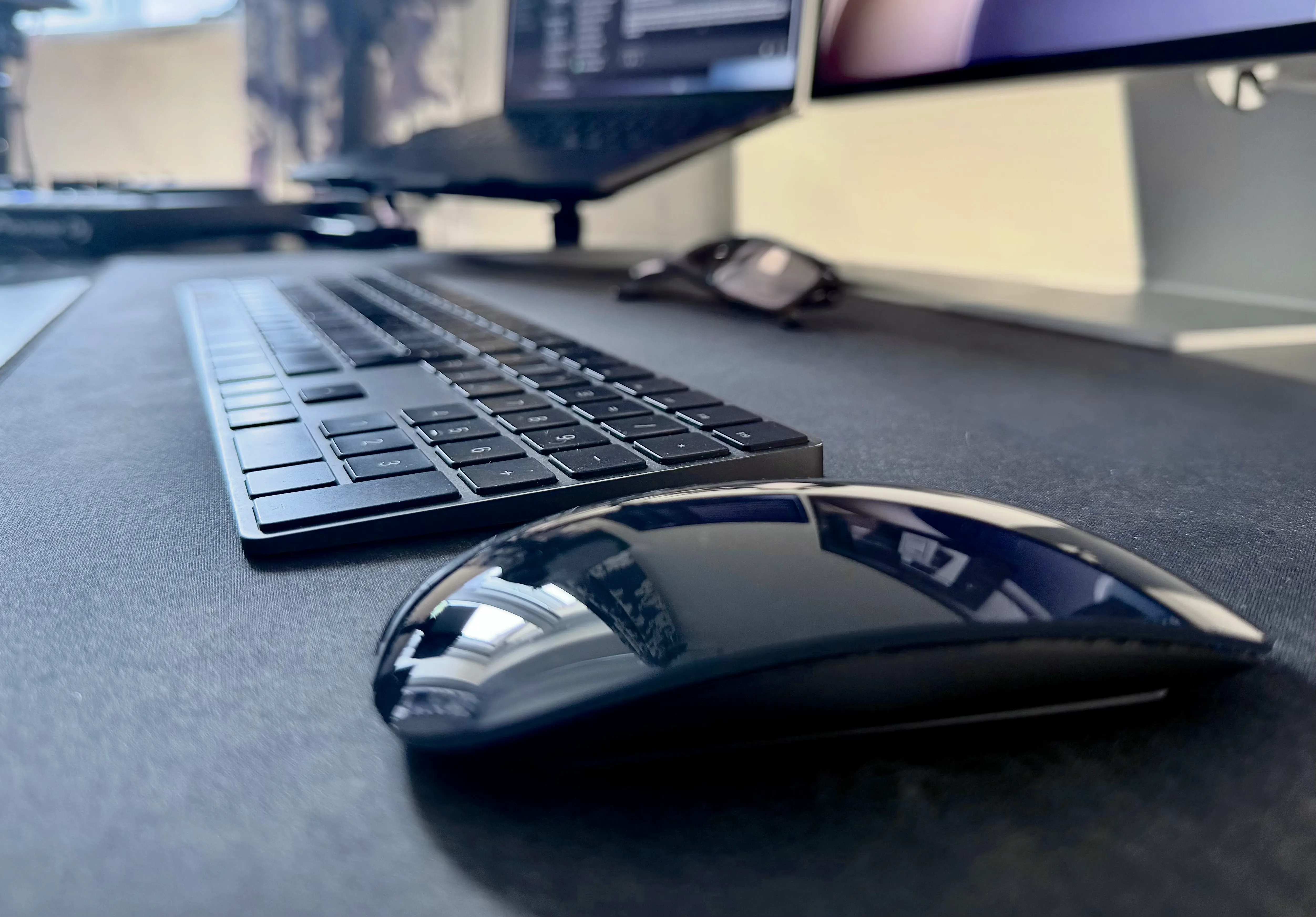 Laptop, mouse and external monitors at a desk