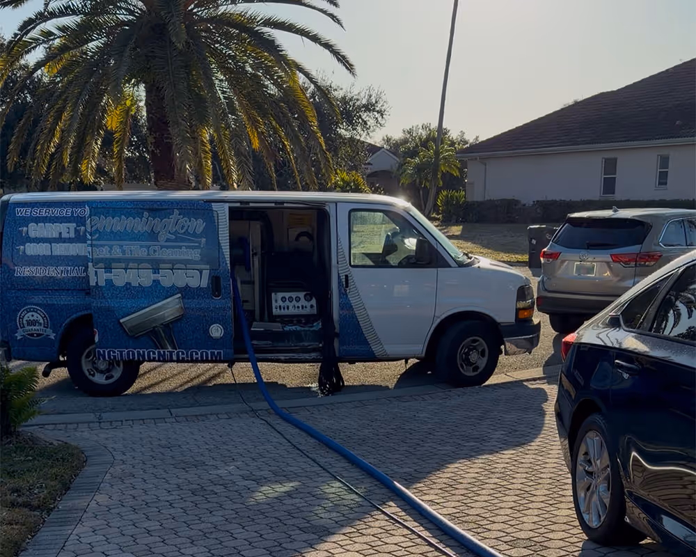 Remmington Carpet & Tile Cleaning van at a Bradenton home.