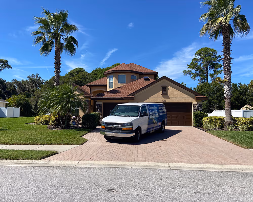 Remmington Carpet & Tile Cleaning van parked outside of a Bradenton home, ready to provide carpet cleaning services.