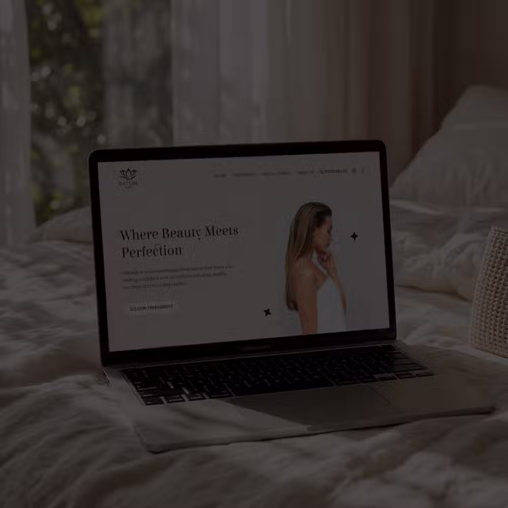 Beauty salon website design shown on a mobile phone with online booking