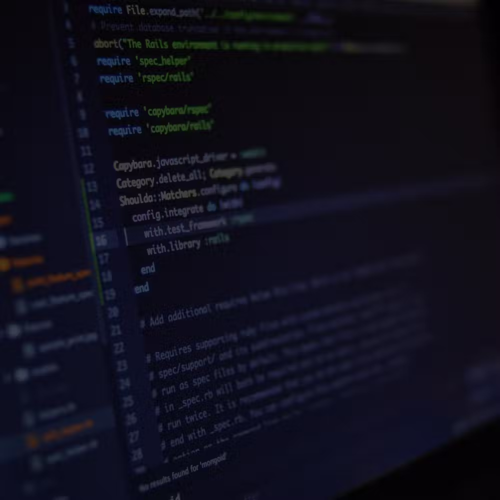 Web designer reviewing a website pricing breakdown on screen