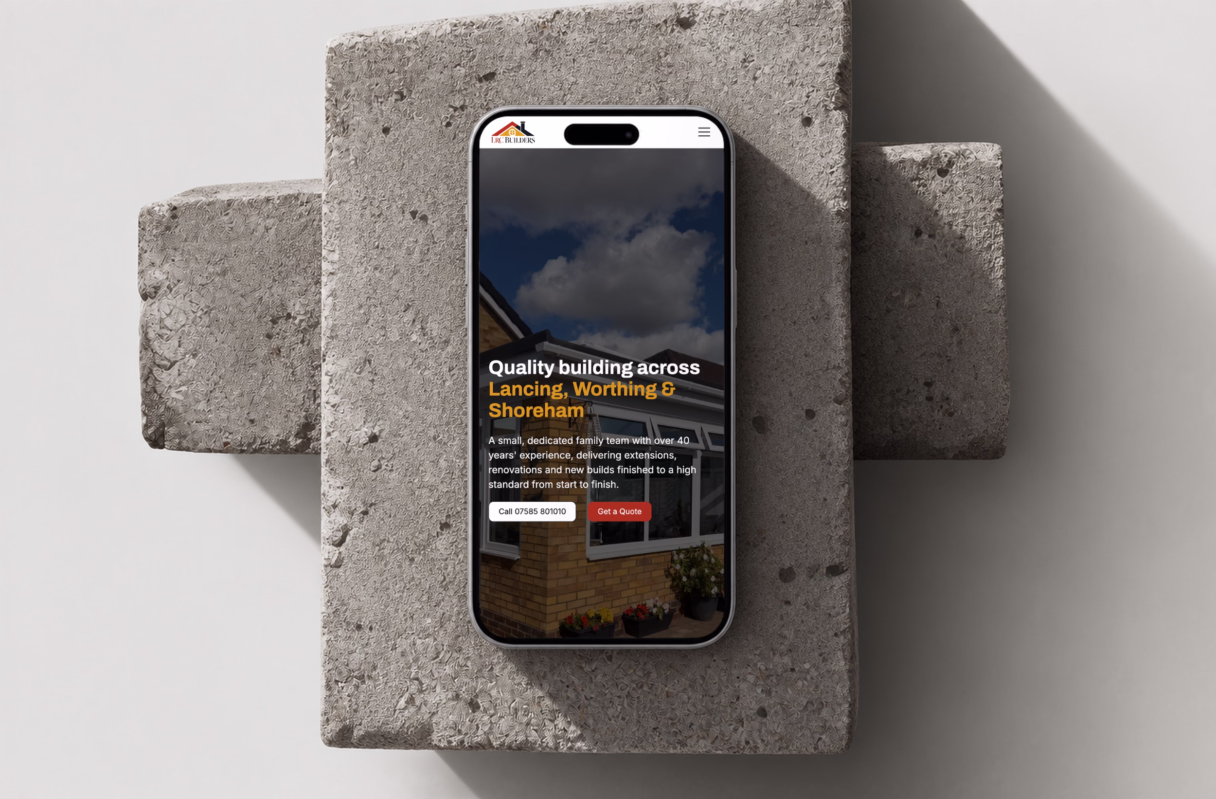 Phone mockup of a builder website with a floating WhatsApp button and quote form