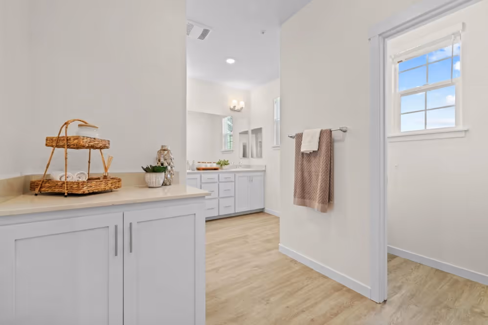 Bathroom with white cabinets