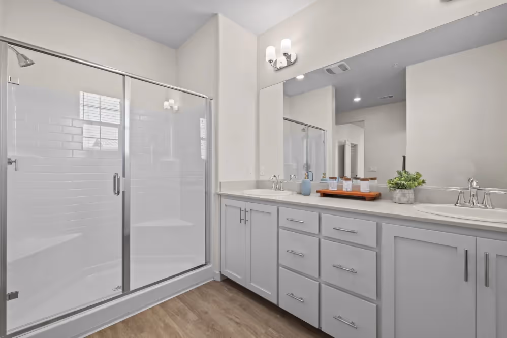 Bathroom with white cabinets