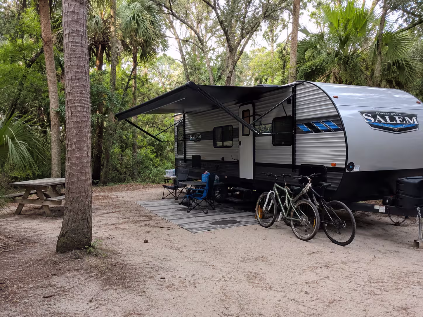 Camper rental parked at a Palm Beach area campground