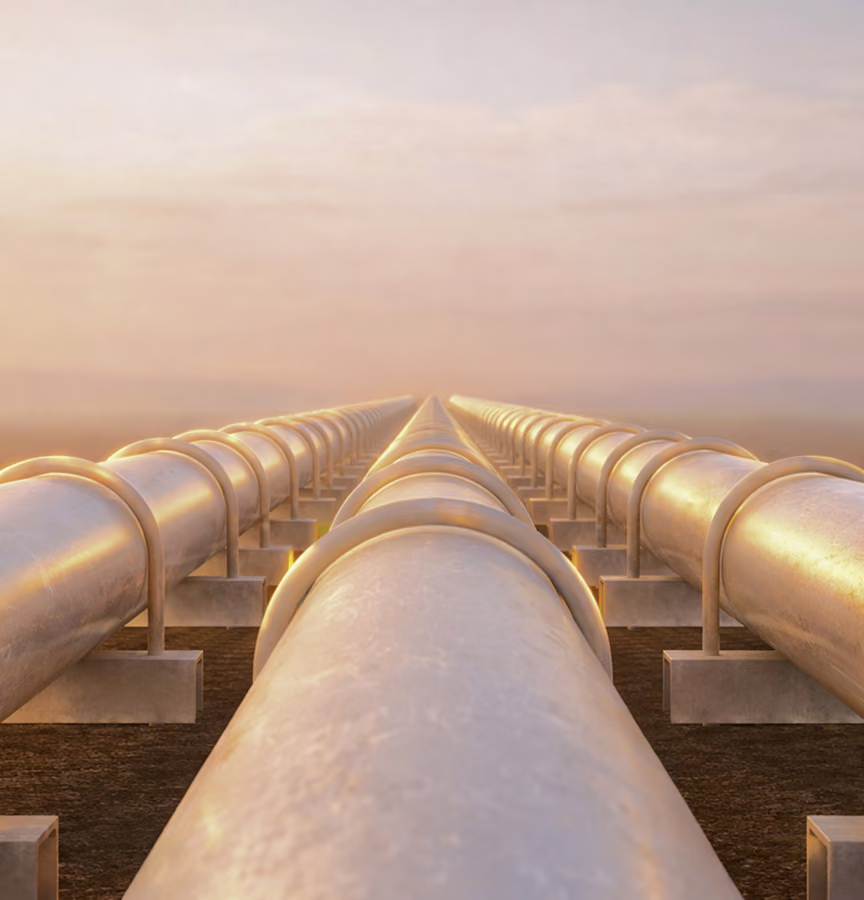 Three large industrial pipelines extending into the distance with a digital overlay showing 92% efficiency.
