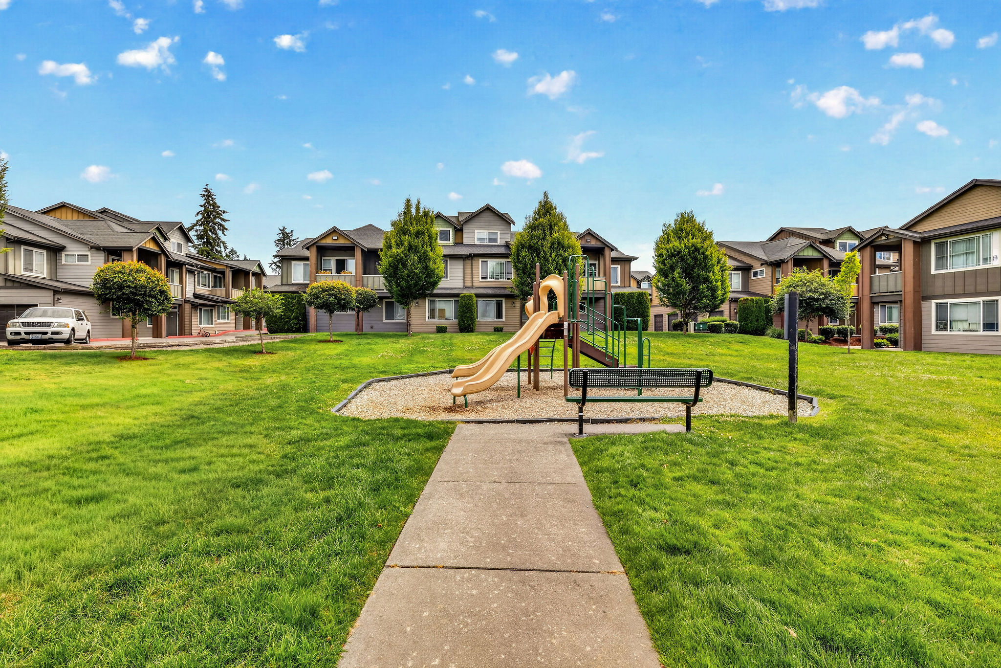 Playground near building Rentals at Bella on Canyon 