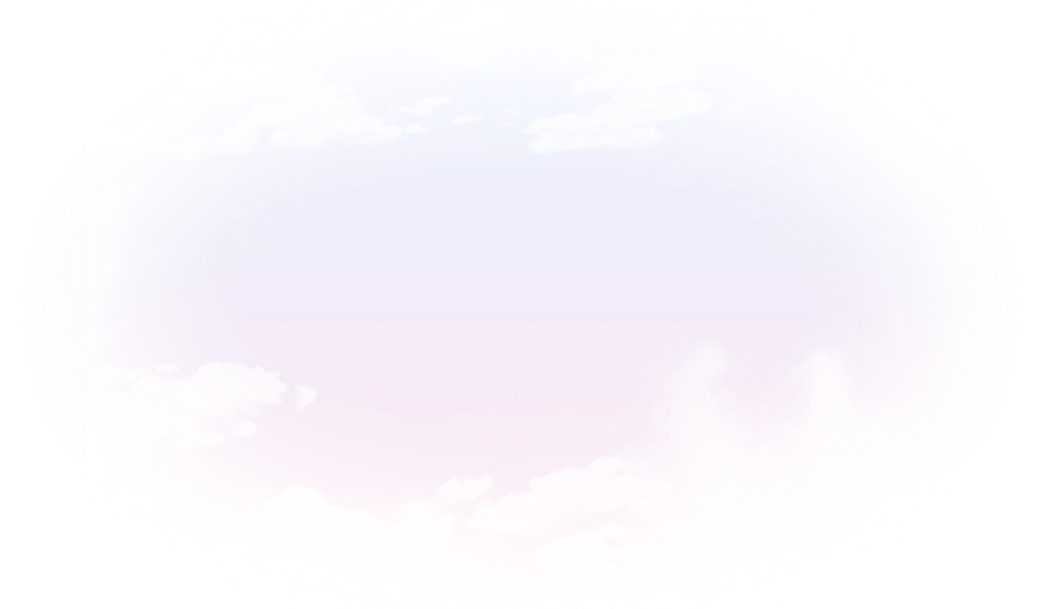 Soft pastel sky with light pink and blue hues scattered with white fluffy clouds.