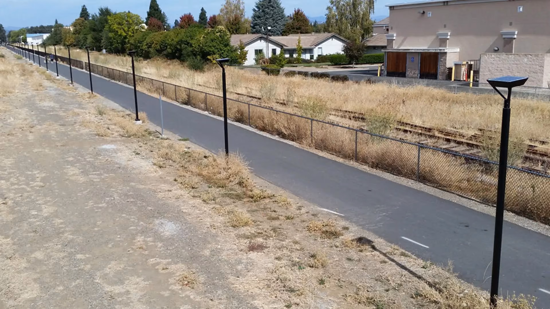 FLT solar pathway lights installed along rail with trail project