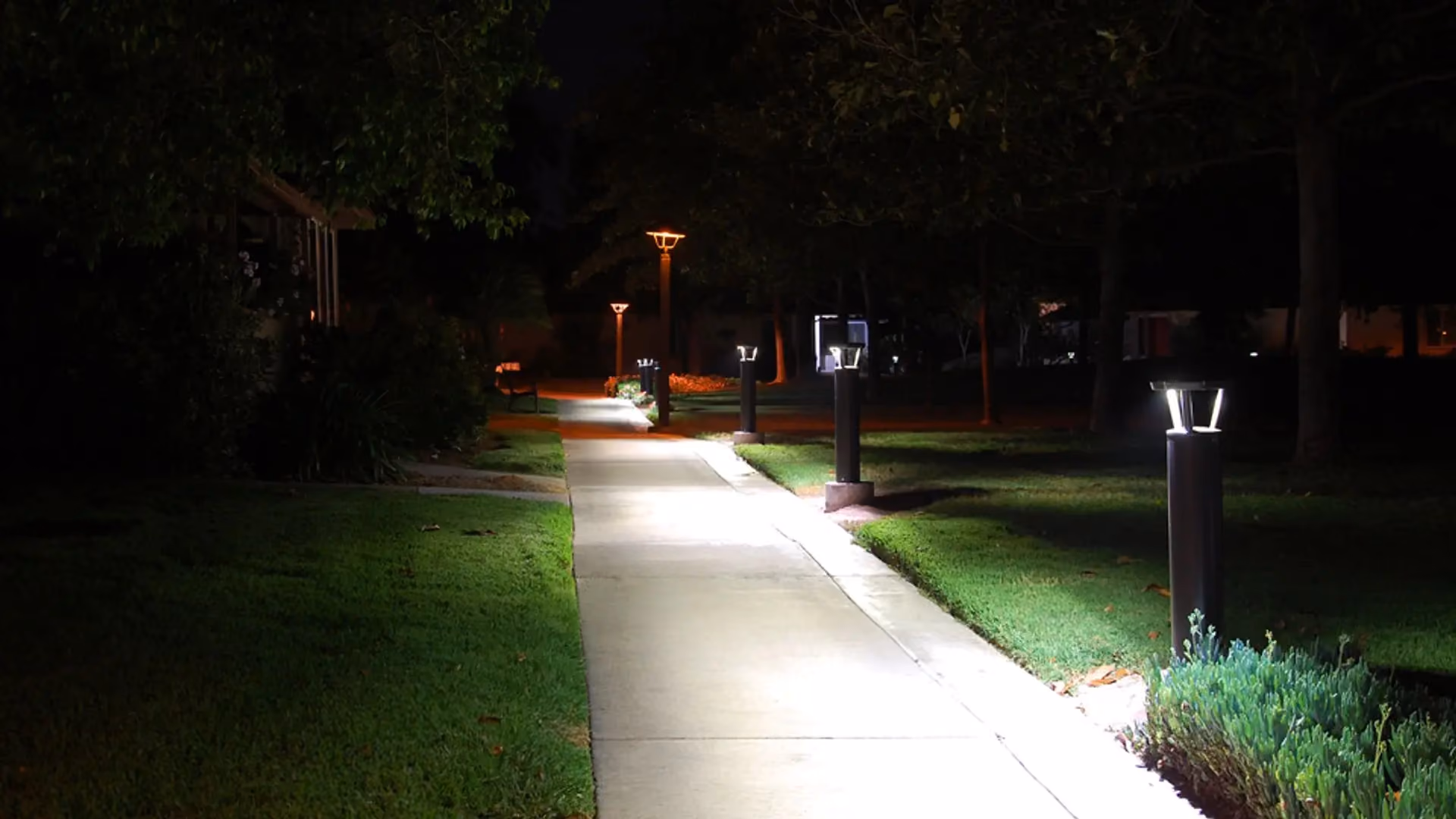 FLT solar lights illuminating outdoor community gathering space at night