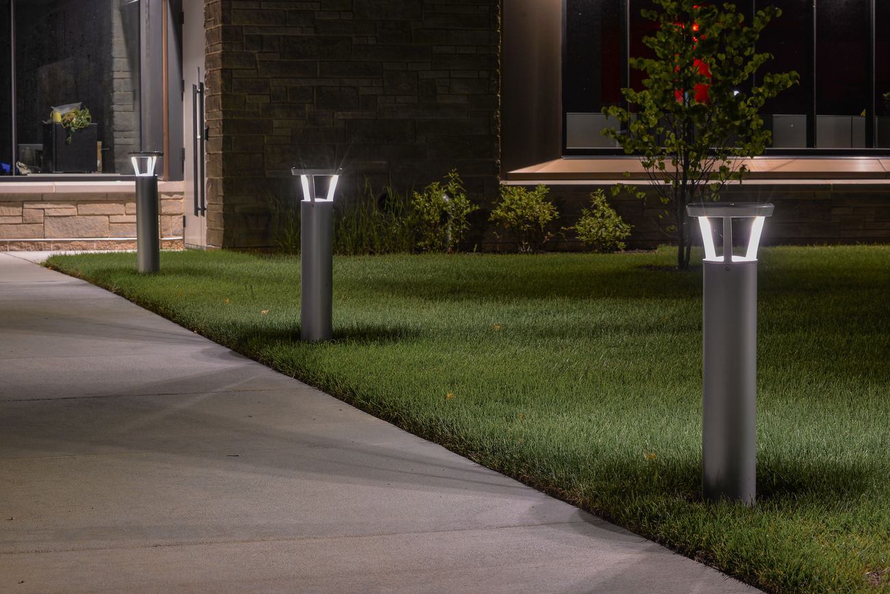 FLT PLB solar bollards lining a walkway at night