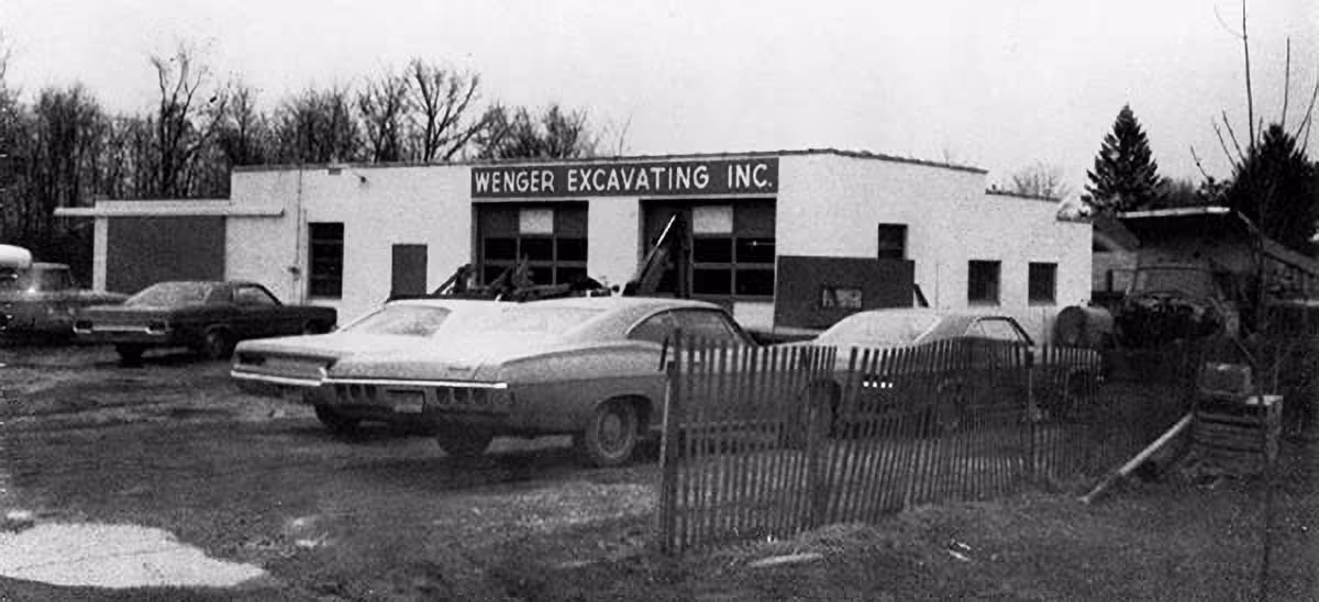 Historic photo of Wenger Excavating's original headquarters and equipment yard during the company's early years in Ohio.