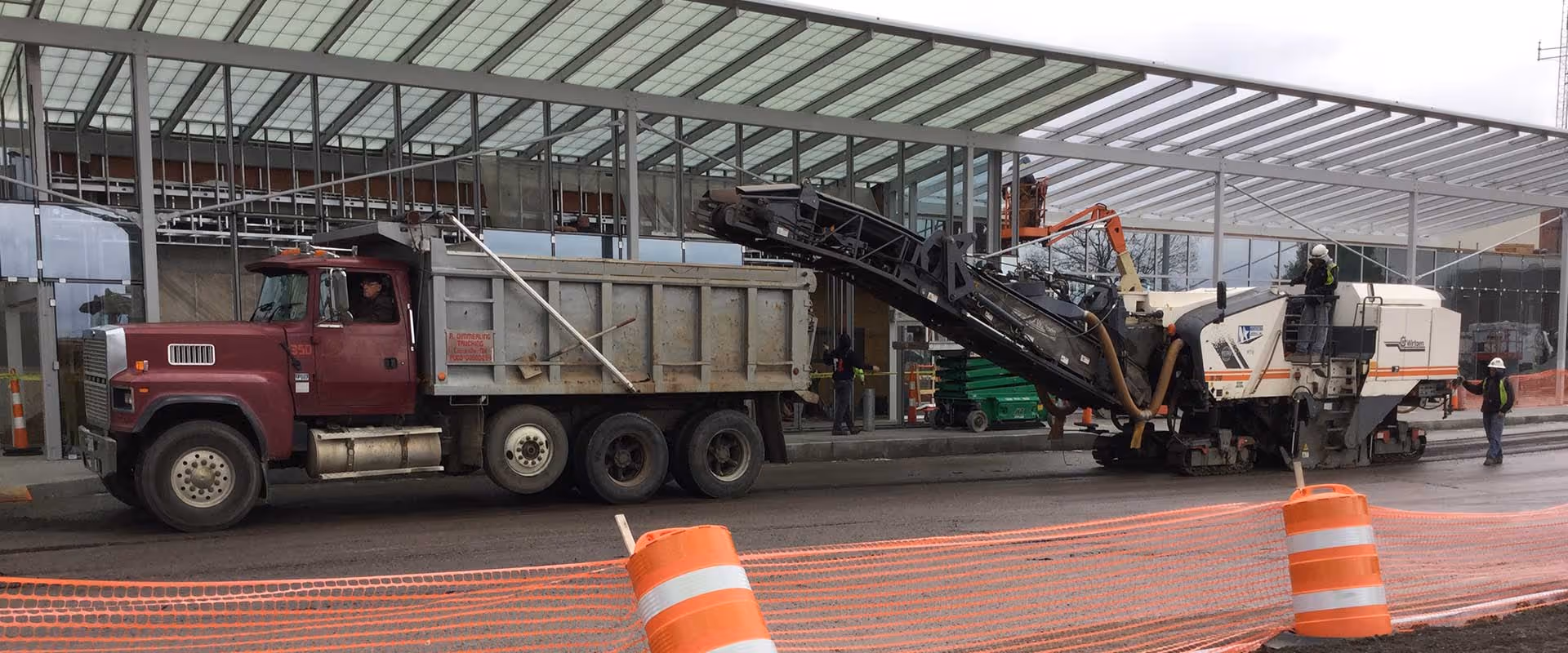 Roadway milling equipment operating at Akron-Canton Airport during infrastructure construction project.