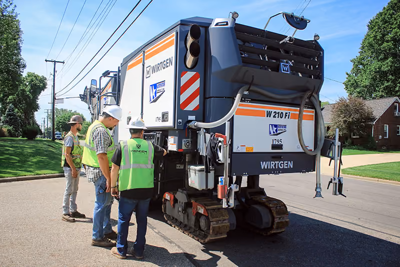 Northstar Asphalt crew operating a Wirtgen asphalt milling machine during a roadway resurfacing project.