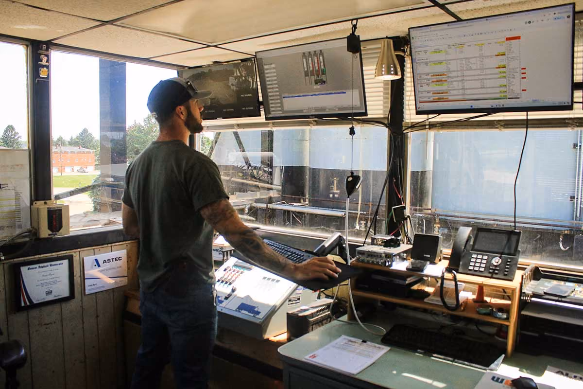 Plant operator overseeing aggregate production at the Massillon Materials processing facility.