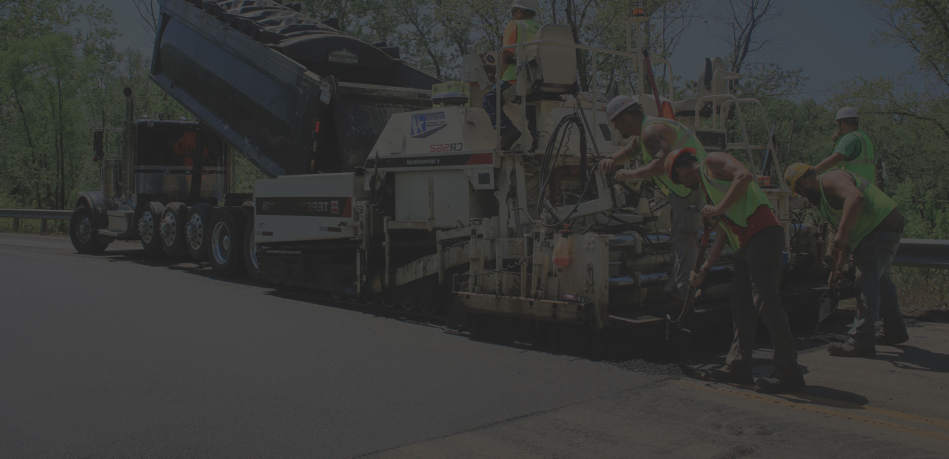 Northstar Asphalt paving crew placing hot mix asphalt during a commercial roadway paving project in Ohio.