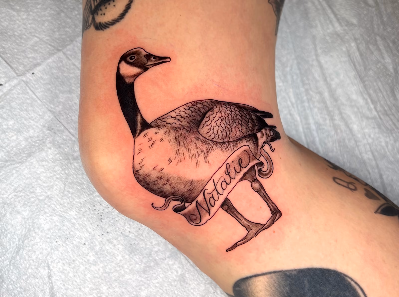 Traditional tattoo by Mike McAskill – bold color work, Riverside CA