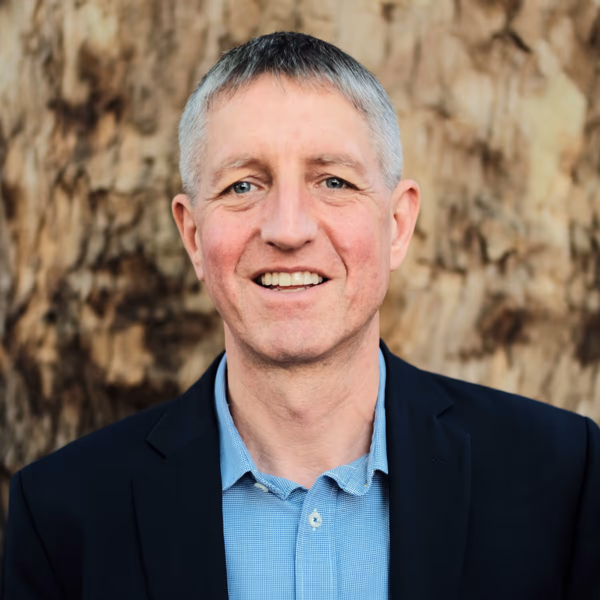 Portrait of Iain Smale, Founder and Co-Managing Director of Pangolin Associates.