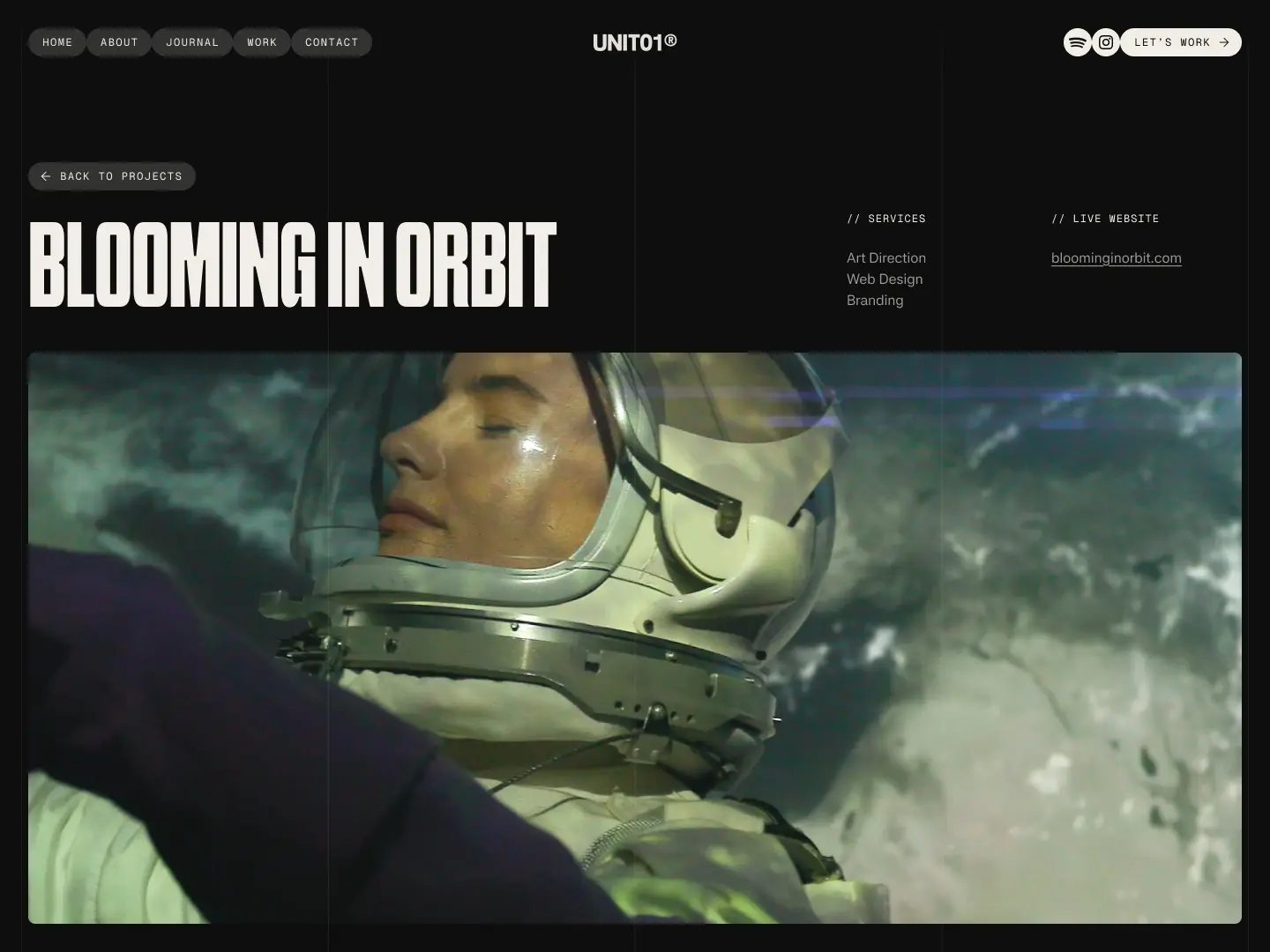Astronaut with closed eyes floating in space with Earth visible in the background.