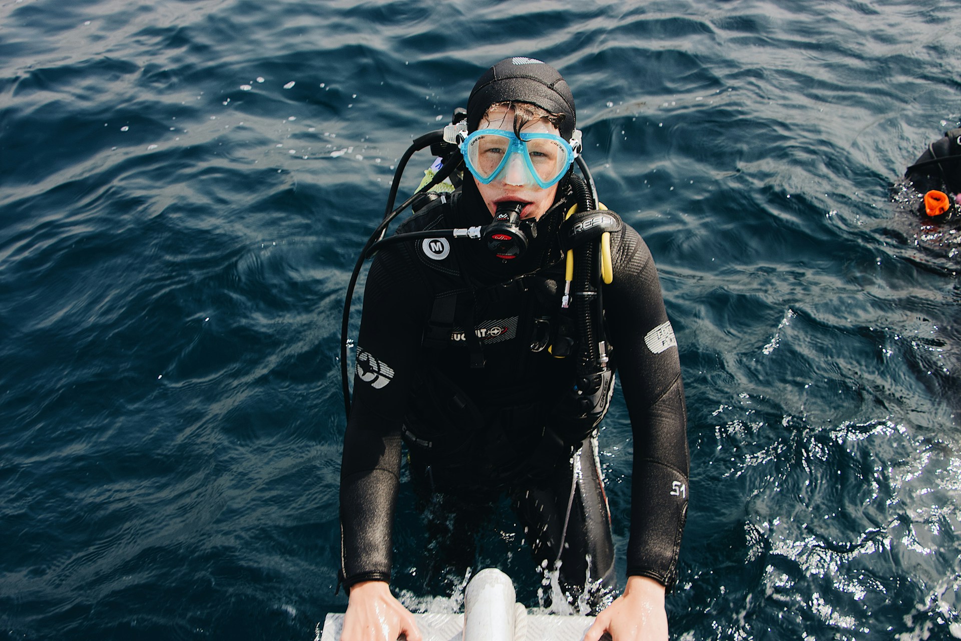man-wearing-scuba-diving-suit
