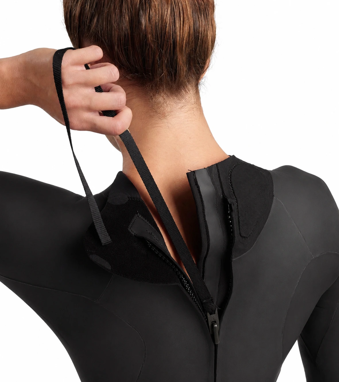 Close-up of a textured black fabric with a wavy pattern and intricate mesh-like surface.