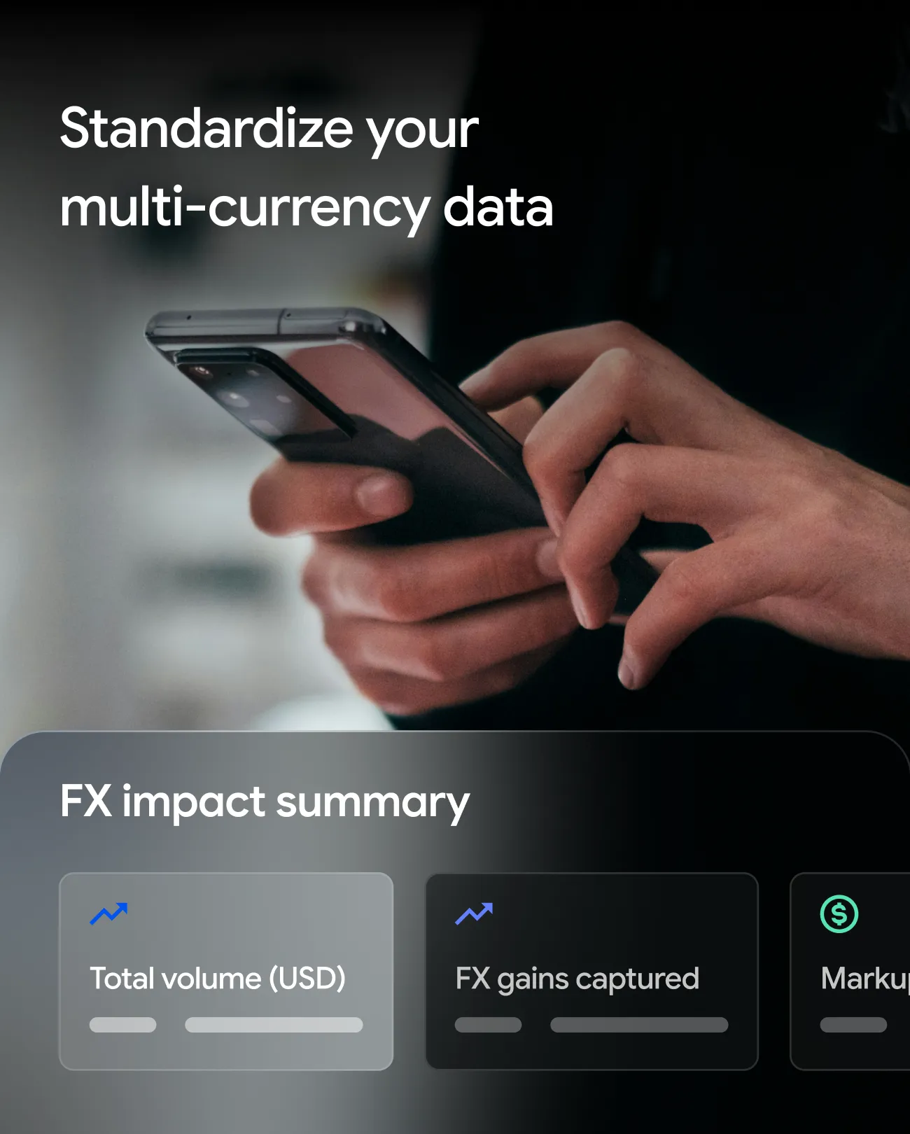 Person holding a smartphone with text about standardizing multi-currency data and FX impact summary.