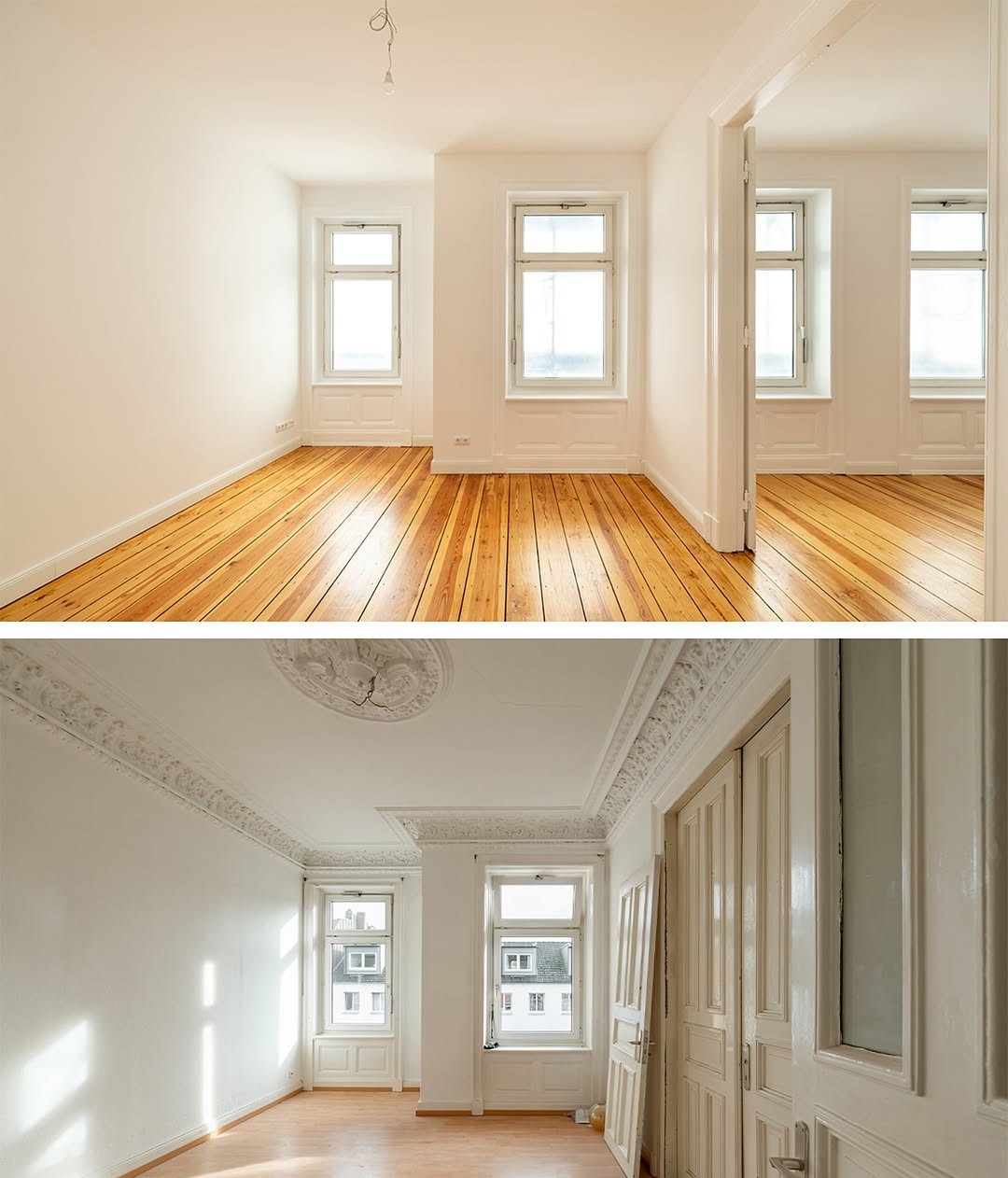 Heller Altbau Wohnraum mit Holzboden, weißen Wänden und hochwertig ausgeführter Renovierung