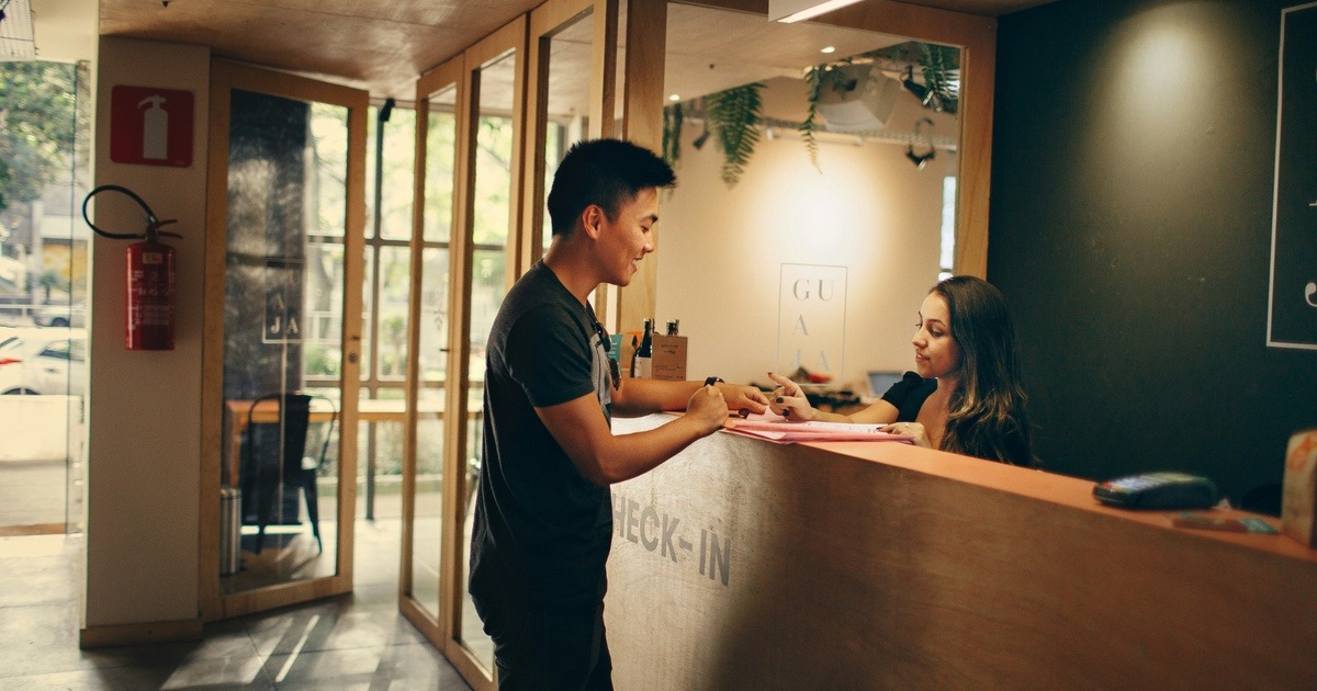 Source:https://unsplash.com/photos/man-in-black-shirt-standing-beside-counter-yIcm3DWRz-c