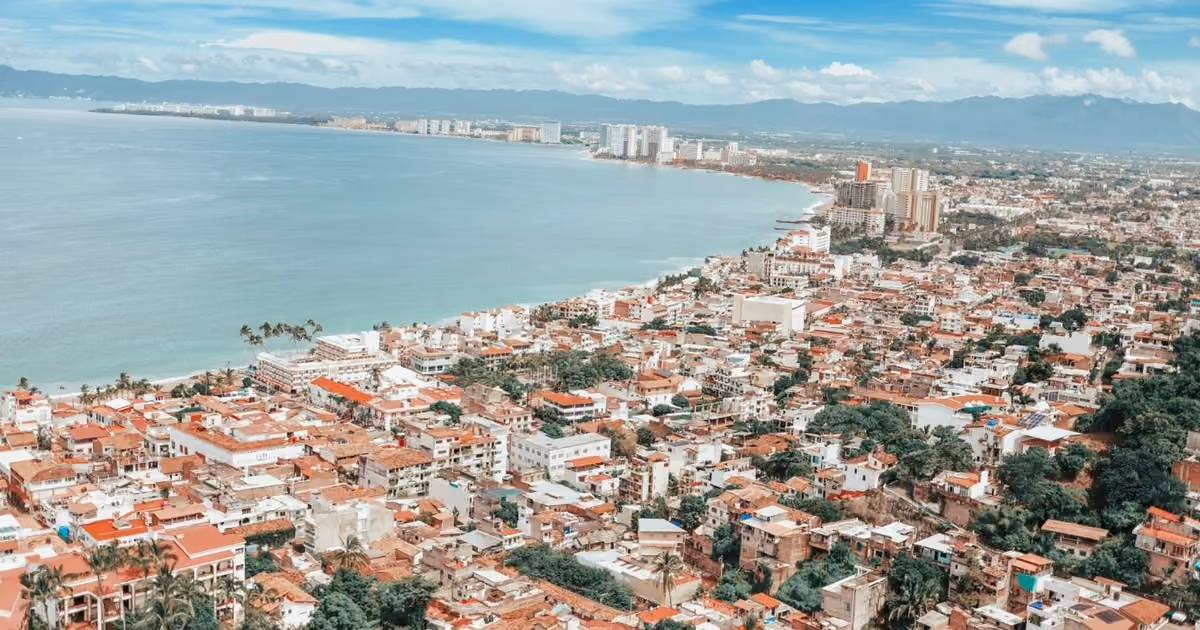 Source: https://unsplash.com/photos/aerial-view-of-city-near-body-of-water-during-daytime-S80jRUrTAqA