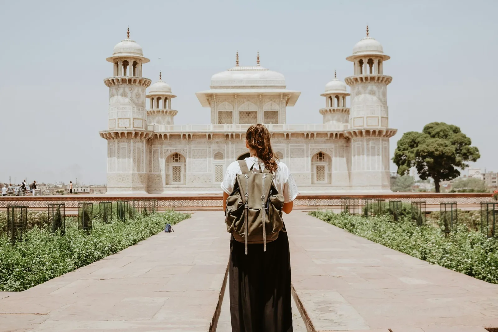 source: https://unsplash.com/photos/woman-near-beige-painted-building-Y6tBl0pTe-g