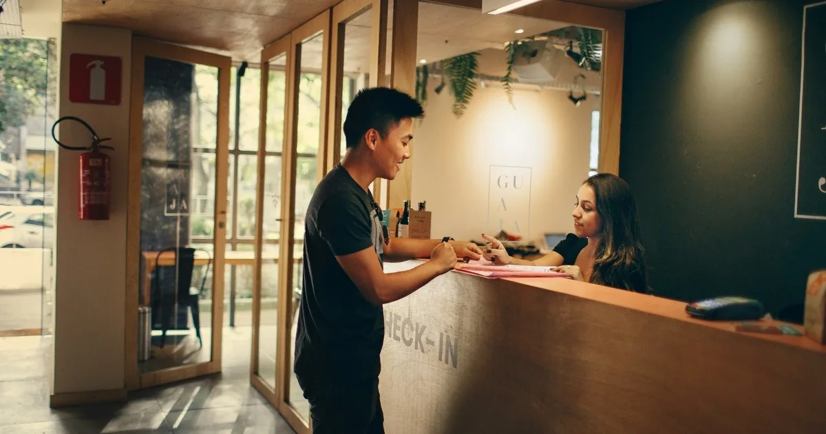 Source:https://unsplash.com/photos/man-in-black-shirt-standing-beside-counter-yIcm3DWRz-c