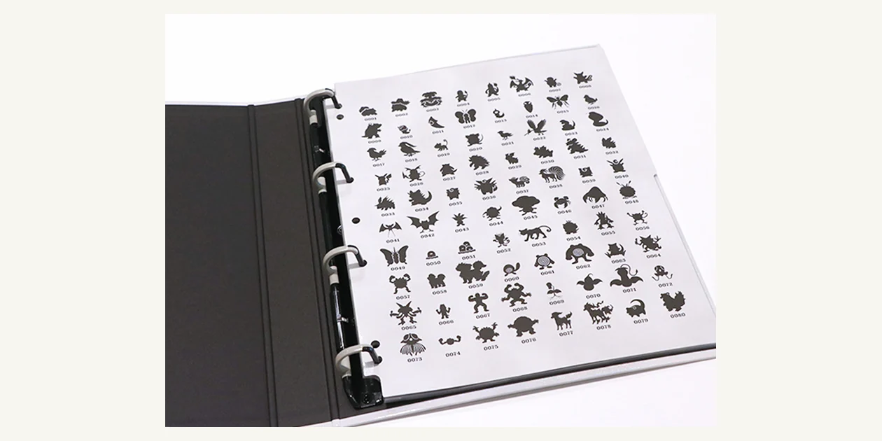 Official view inside the Kanto Collection File Premium showing its four-ring mechanism and index sheet