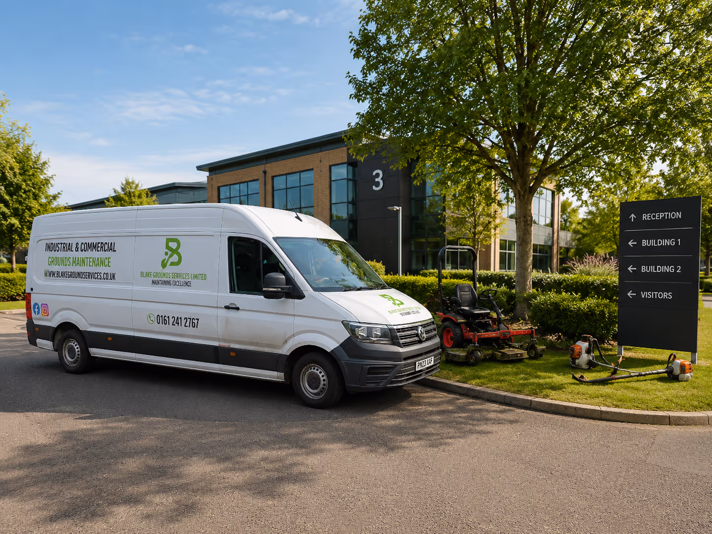 White van parked by a sign and lawn equipment outside a modern office building numbered 3.
