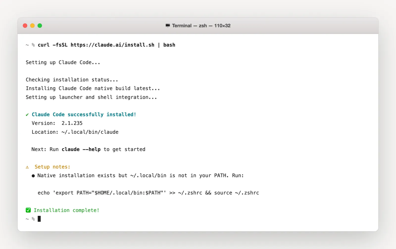 Terminal showing a successful native Claude Code installation and the PATH setup note