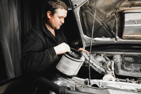 Blye Philip, mobile mechanic servicing cars engine