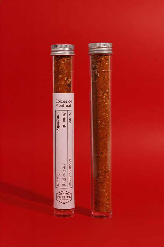An image of the Montreal Steak Spice's container standing against a red background.