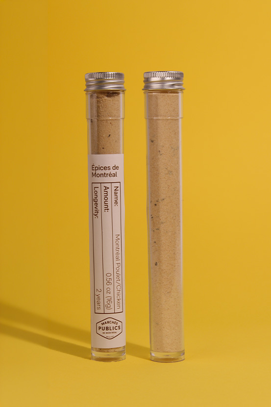 An image of the Montreal Chicken Spice's container standing against a yellow background.