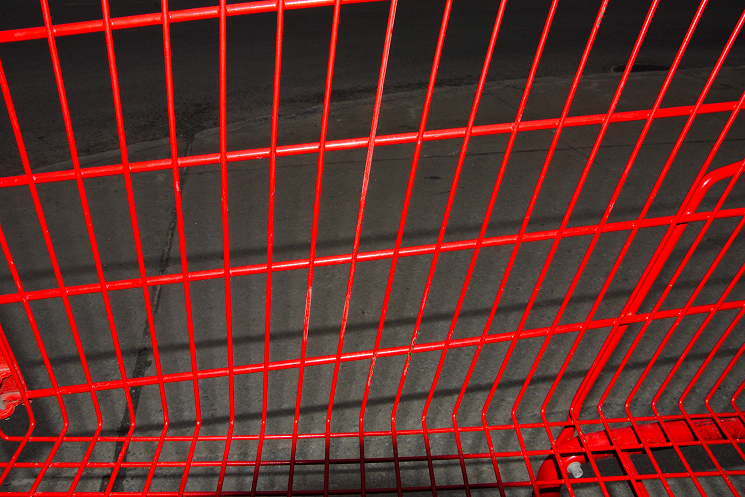 Close-up shot of a red cart's pattern.