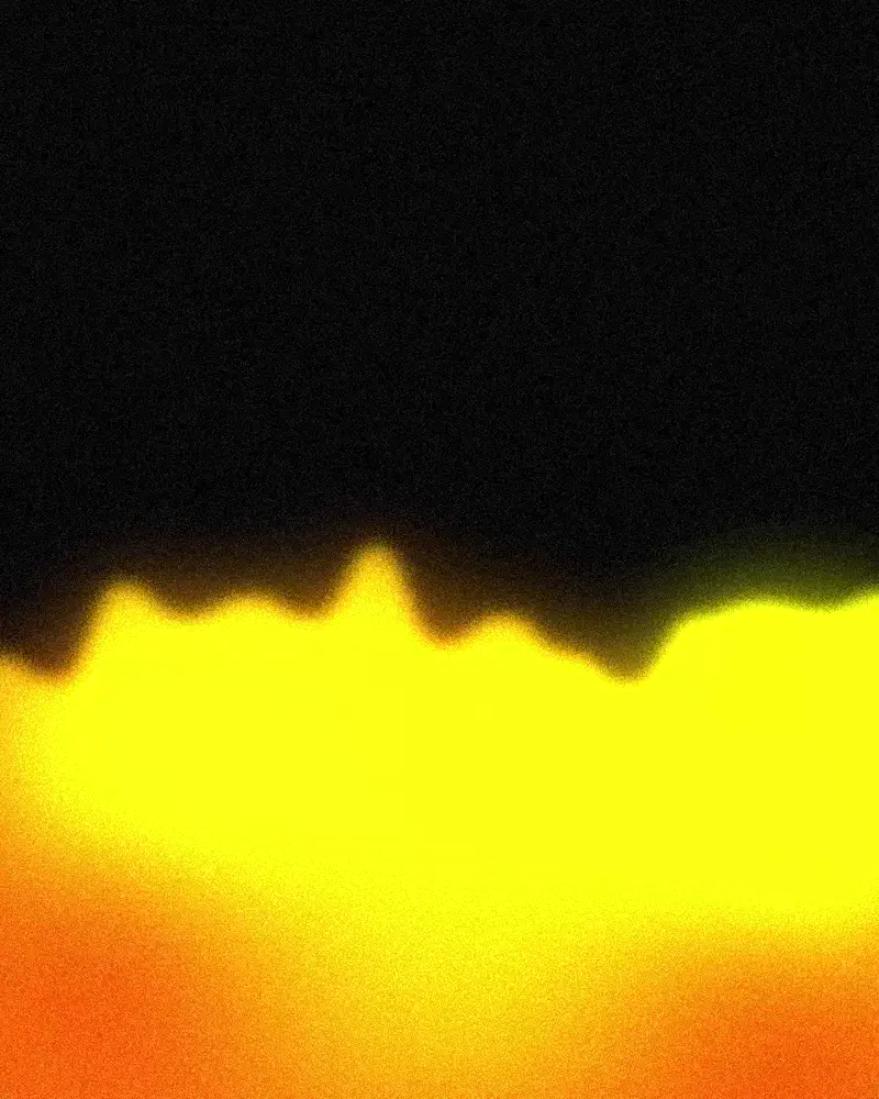 Abstract gradient background with a bright yellow and orange glow blending into black at the top.