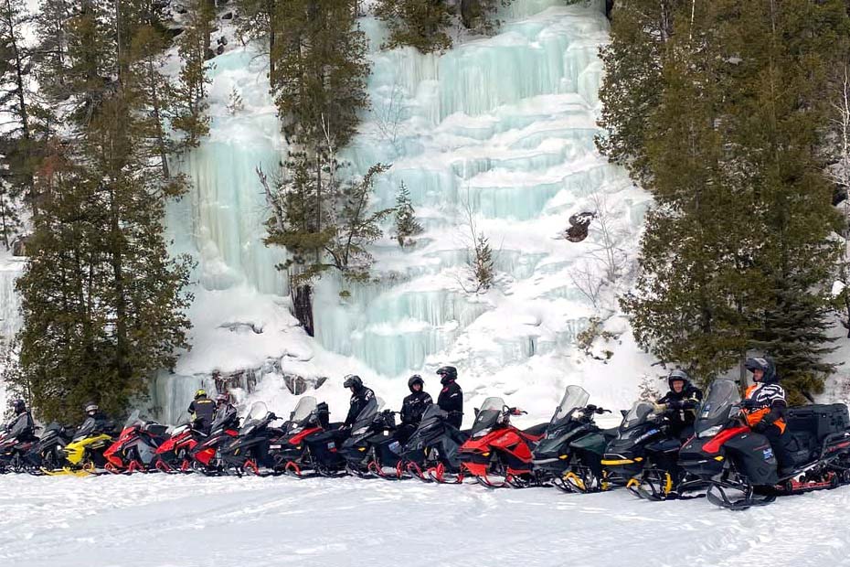 Snowmobiling groomed Temagami forest trails